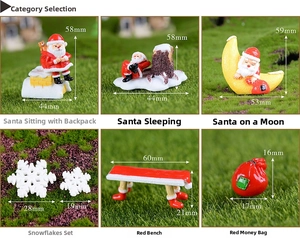 Macro set of miniature resin Christmas figurines including Santa Claus and winter landscape decor