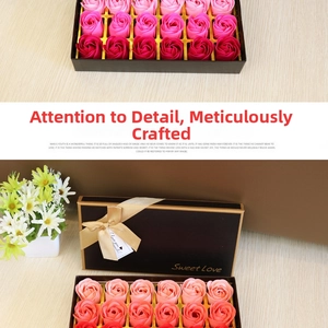 Macro shot of 18 realistic scented soap roses in a black gift box with a silk bow