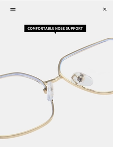Macro view of comfortable transparent silicone nose pads on golden metal glasses frames