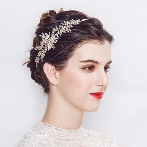 Macro view of bridal headband with silver wires, clear rhinestones and faux pearls