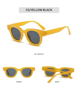 Detaillierte Mehrwinkelansicht gelbe ovale Sonnenbrille mit schwarzen Gläsern und Nieten