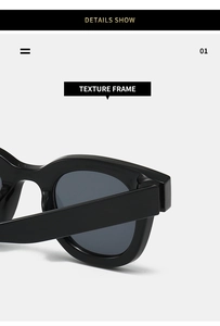 Detailansicht des glatten Rahmens und Scharniers der schwarzen ovalen Trendsonnenbrille