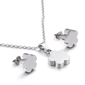 Minimalist silver flower jewelry set with floral pendant necklace and stud earrings