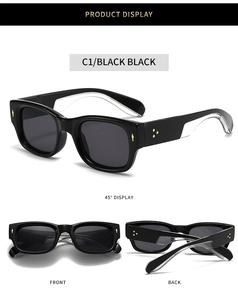Vue détaillée de lunettes de soleil carrées noires avec clous dorés et branches profilées