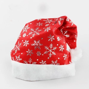 Red Christmas hat with silver snowflake patterns and white plush trim on white background