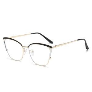 Cat eye glasses frame in gold metal with black accents and lightweight hollow temple design