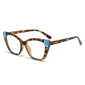 Chic leopard print cat-eye glasses with striking blue accents on a clean white background