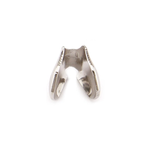 Macro shot of silver U-shaped metal buckle with polished surface and smooth texture