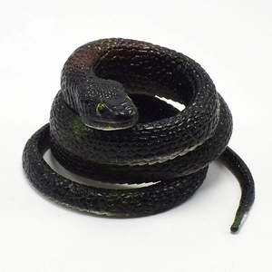Close-up of realistic cobra snake toy showing detailed black scales and coiled posture