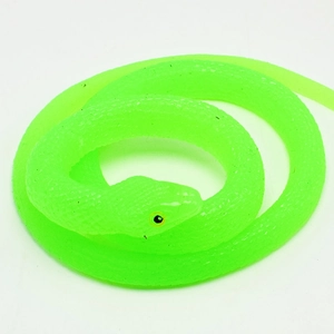 Close-up of flexible TPR fluorescent green prank snake with realistic coiled texture