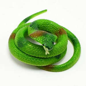Detailed view of cobra toy showing realistic green scale textures and brown patterns