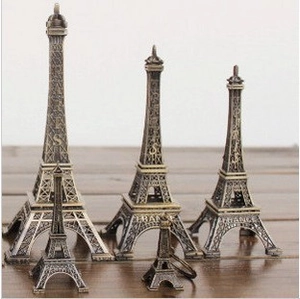 Set of 5 bronze Eiffel Tower statues in various sizes for home decor and photography