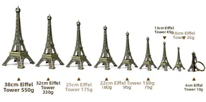 Size comparison chart of bronze Eiffel Tower models from 4cm to 38cm height