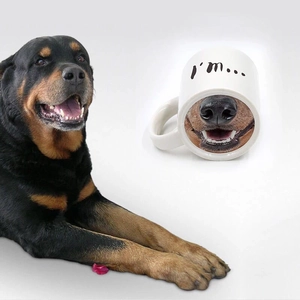 Ceramic Rottweiler dog nose mug with creative funny print on a clean white background