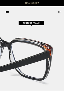 Detail of classic black square glasses frame with tortoiseshell pattern accents