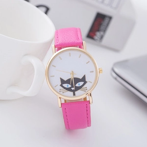 Close-up of bright pink silicone watch with a cute black cat face design on the dial