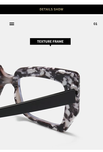Detail showing the thick marble texture frame and sturdy side hinge on these fashion glasses