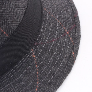 British style herringbone wool fedora hat with orange plaid pattern and black ribbon detail