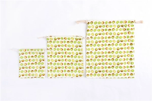Three-piece set of cotton linen drawstring bags with fresh kiwi fruit print patterns