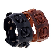 Detail of vintage braided leather bracelets in black and brown with metal buckles