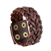 Detail of vintage dark brown braided leather bracelet with adjustable brass buckles