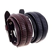 Detail of wide multi-layer leather bracelets in black and brown with alloy metal clasps