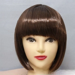Front view of a dark brown bob wig with flat bangs on a mannequin head model