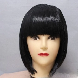 Detail view of black bob wig with straight bangs and smooth synthetic fiber texture