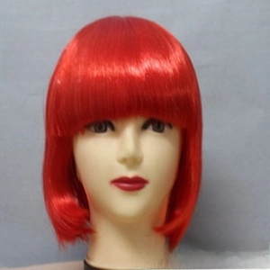 Detail of red short bob wig with straight bangs on a mannequin head against blue wall