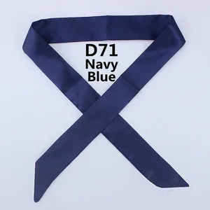 Detail of navy blue satin skinny scarf for bag handle decoration in a sleek X-fold layout