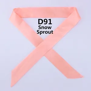 Detail of skinny apricot pink satin scarf D91 with elegant smooth glossy texture