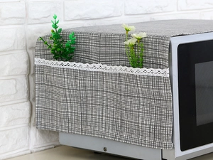 Linen microwave dust cover with grey check pattern, lace trim and side storage pockets