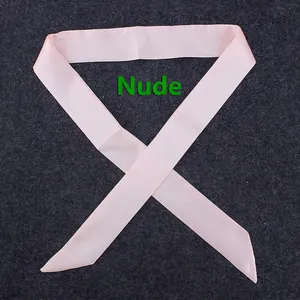Detailed view of nude satin skinny scarf with silky texture on grey background