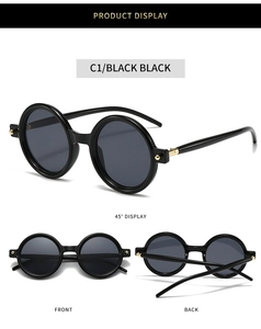 Detailed views of vintage round sunglasses in black with gold accents and dark lenses
