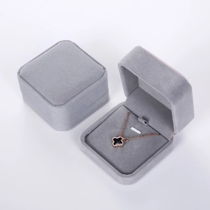 Elegant grey velvet jewelry gift box showing both open and closed square flip positions