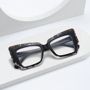 Modern geometric cat-eye blue light blocking glasses with black and tortoise shell frame