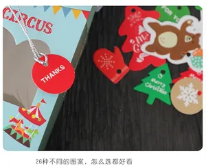 Detail of colorful gift tags with circus and Christmas themes on dark wood background