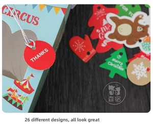 Detail of colorful gift tags with circus and Christmas themes on dark wood background