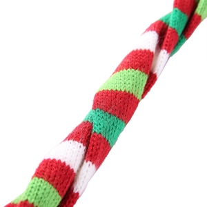Close-up of the red and green knitted Christmas scarf texture for large dogs