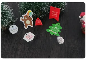 Selection of festive Christmas and birthday gift tags with reindeer and tree motifs