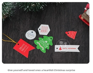 Detailed festive Christmas gift tags set in various shapes with gold strings on wood background