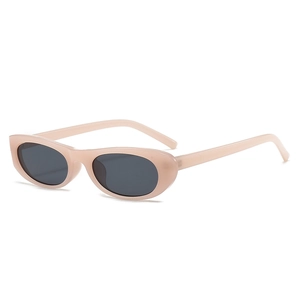 Lunettes de soleil ovales rétro avec monture épaisse beige clair et verres foncés