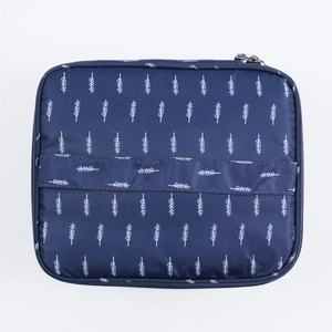 Large capacity dark blue makeup organizer bag with white leaf patterns and top zipper