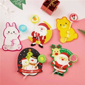 Christmas lollipop decorative cards with Santa, Reindeer, and Bunny cartoon designs