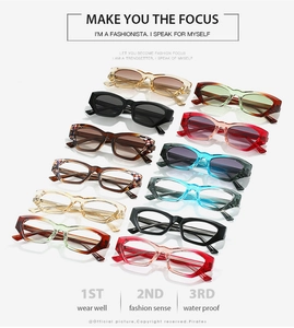 Flat lay of retro cat-eye sunglasses collection in various colors with high-end finishes