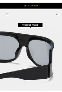 Macro detail of high-quality thick black texture frame with glossy finish and grey lenses