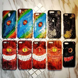 3D relief phone cases with various designs like evil eyes and steampunk skulls