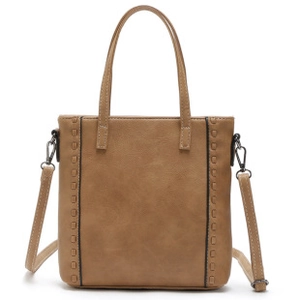 Detailed view of camel brown PU leather tote bag with dual zippers and adjustable strap