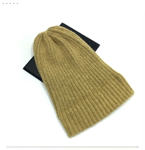 Close-up of khaki ribbed knit beanie with high-quality thick vertical texture details