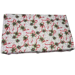 Nordic Christmas tablecloth with festive red berries and holly leaf patterns on white base